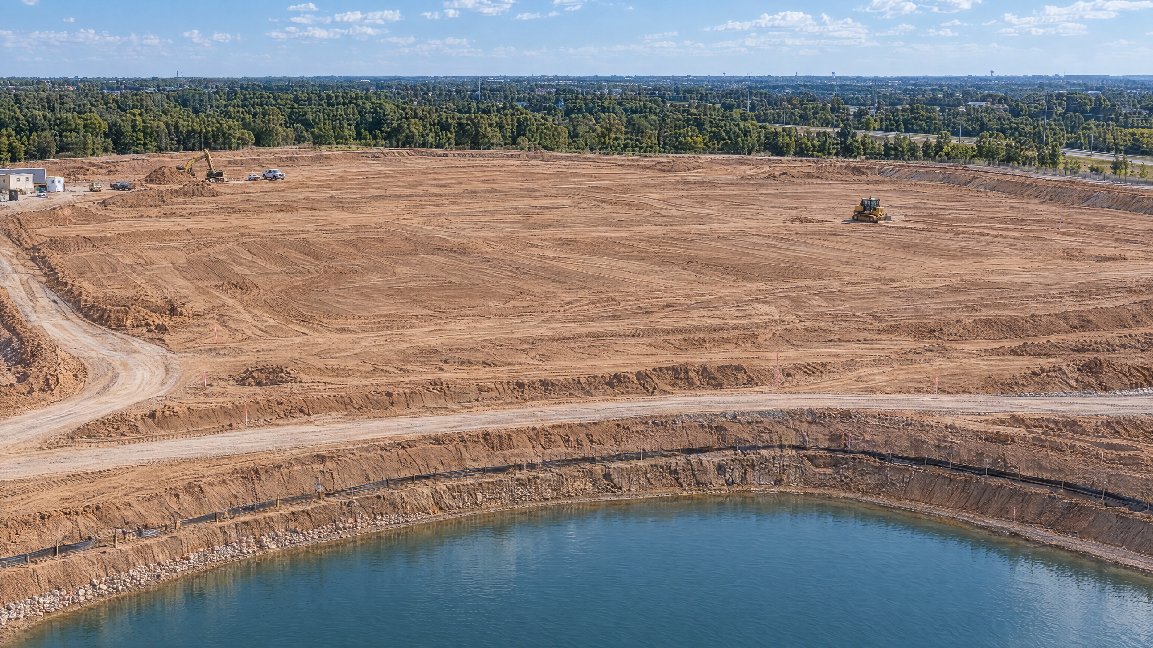 Closer early-site survey view of the graded North Texas building pad